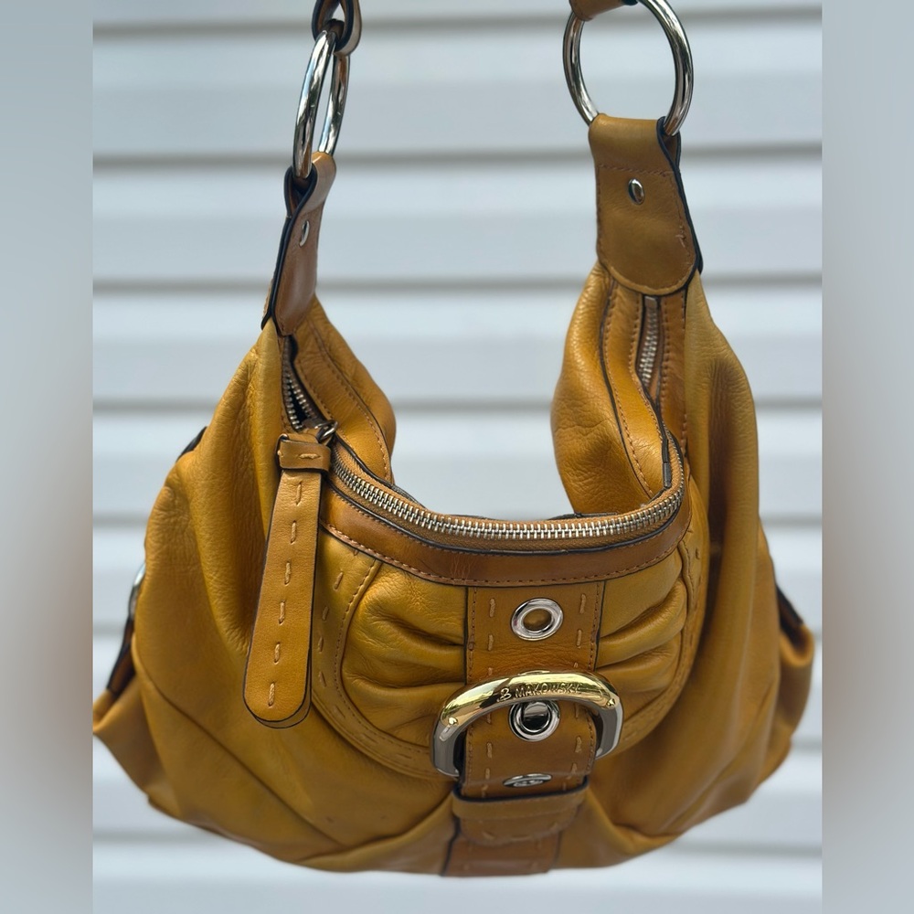 B. Makowsky , leather saffron yellow colored handbag